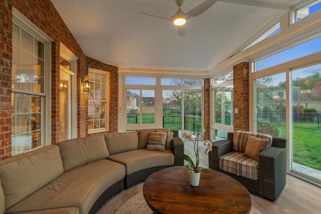 Custom sunroom designed to match brick home exterior in Chesapeake Virginia