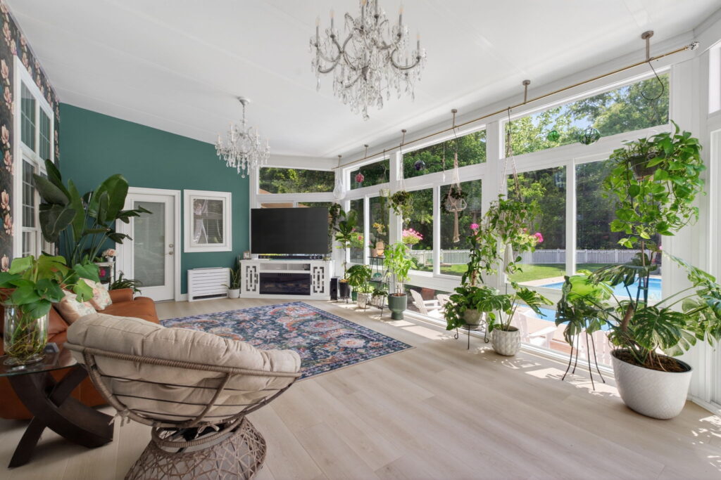 Indoor plants thriving inside climate-controlled 4-season sunroom in Chesapeake Virginia.