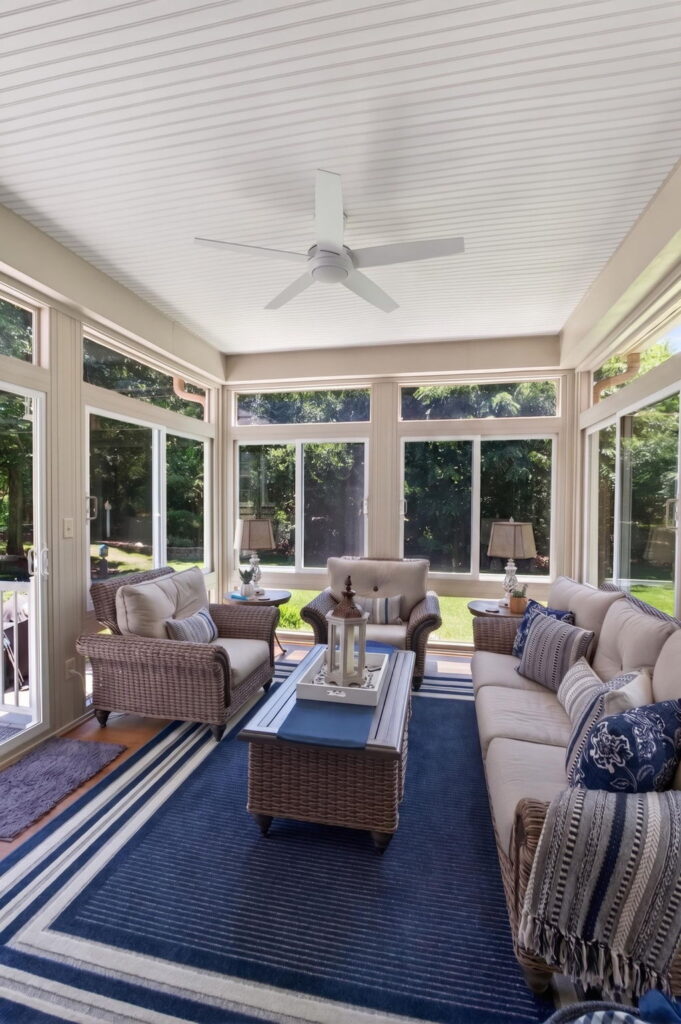 Betterliving 4-season sunroom with wooded backyard views