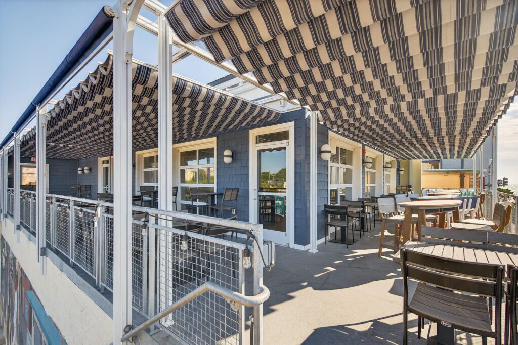 Betterliving pergola and canopy system installation at Lucy's Sky Bar in Virginia Beach