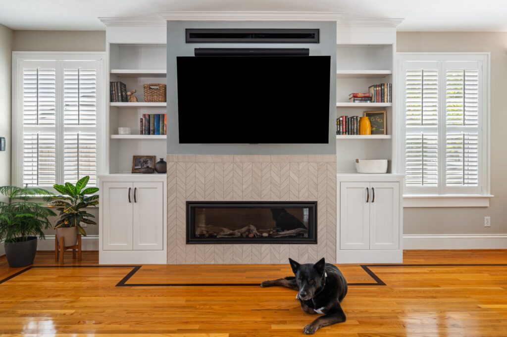 enovated fireplace and a custom-built entertainment center