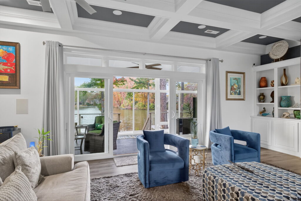 Sunroom interior glowing with natural light, providing year-round comfort and connection to the outdoors.