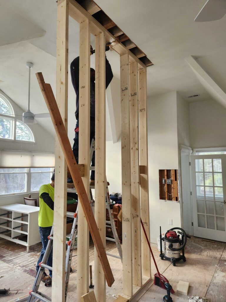 Our team replaced a Grecian column with a brand-new support wall.