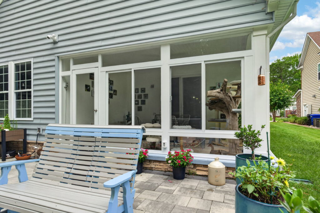 Beautiful completed 3-season sunroom addition in West Neck Village community.
