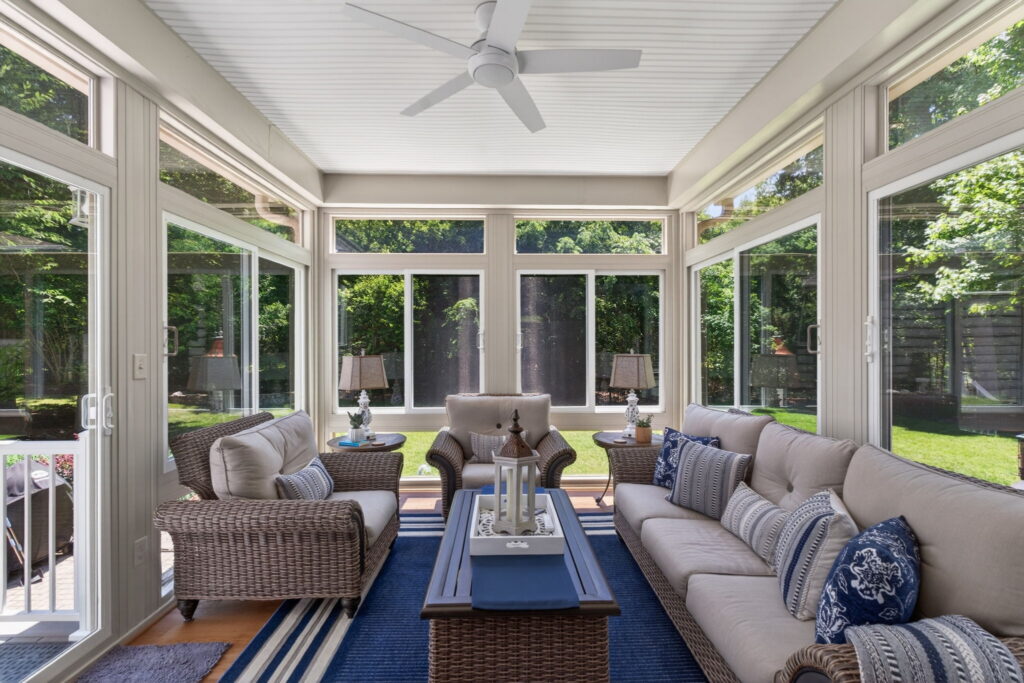 4-season sunroom designed for entertaining and relaxation
