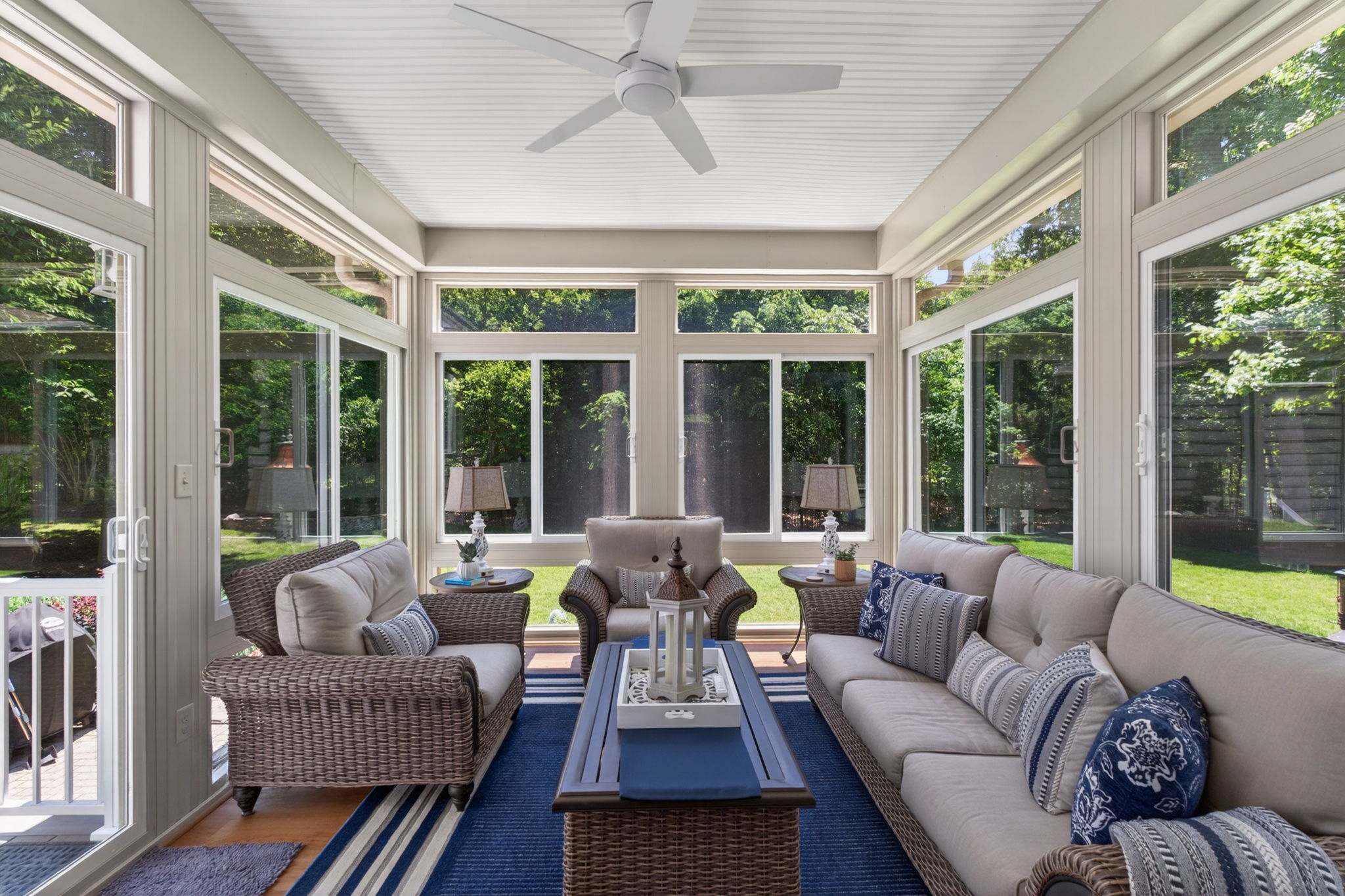 4-season sunroom designed for entertaining and relaxation