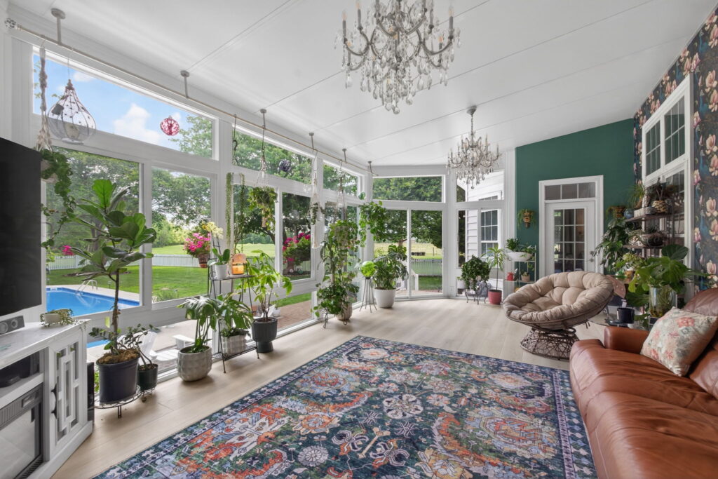 Indoor plants thriving inside climate-controlled 4-season sunroom in Chesapeake Virginia.