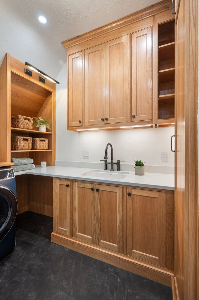 he laundry room in this remodel was thoughtfully designed to reflect the same elevated simplicity and warmth as the kitchen.