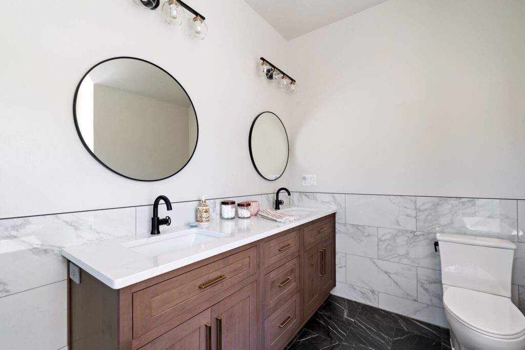 modern double vanity with mixed metal hardware