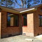 Custom room addition in Chesapeake, VA providing additional family living space with architecture that complements the existing home.