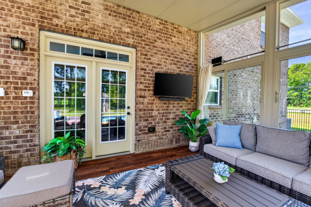 Chesapeake, VA Four Season Sunroom interior set up for watching football and entertaining guests