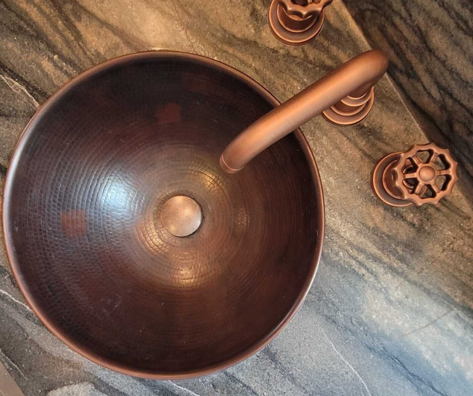 bronze sink and faucet